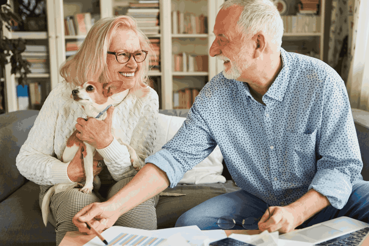 Financial Literacy for Seniors. Senior couple reviewing their finances. 