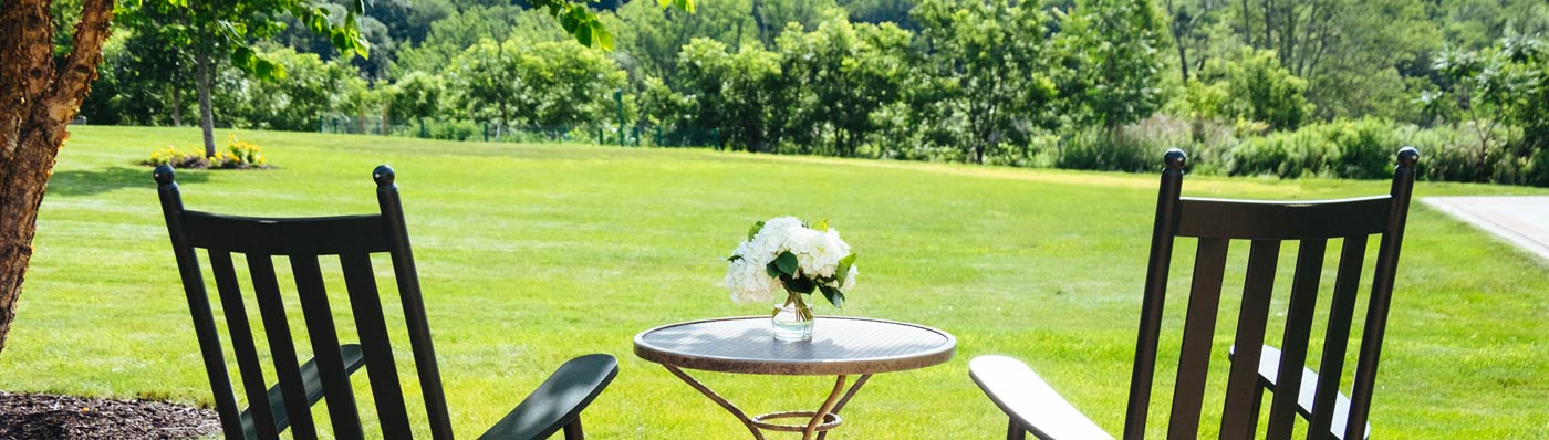 retirement community outdoor sitting area looking out on lawn