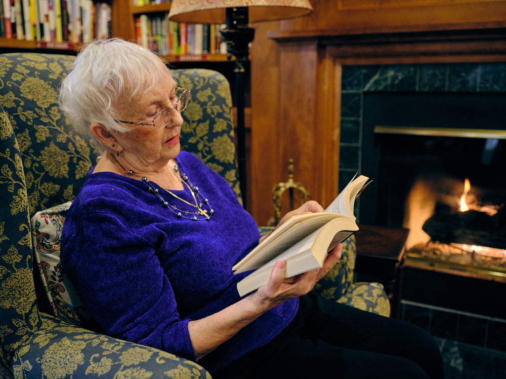 Beverwyck resident reading a book