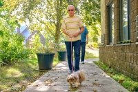 Beechwood residents walking a dog