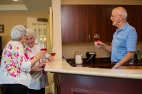 residents socializing at The Glen at Hiland Meadows