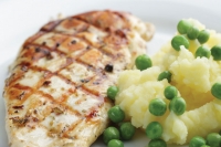food prepared by chef - chicken and potatoes and peas