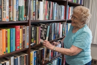 The Terrace at Eddy Memorial resident in library