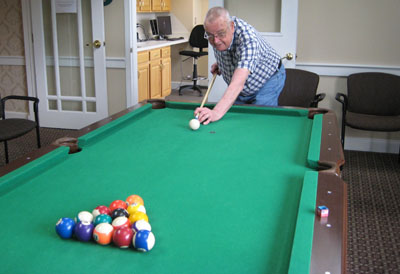John playing pool