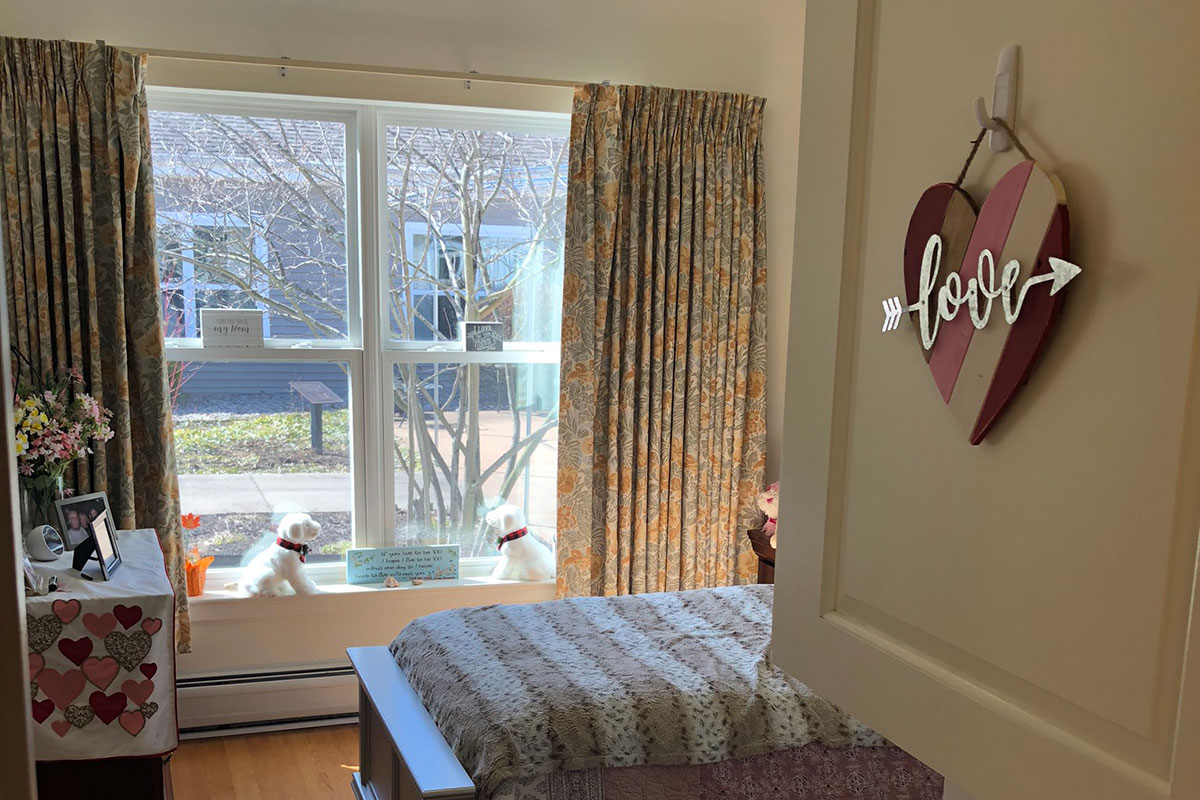 Love sign on door in bedroom at Marjorie Doyle Rockwell Center