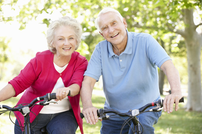 Senior couple biking