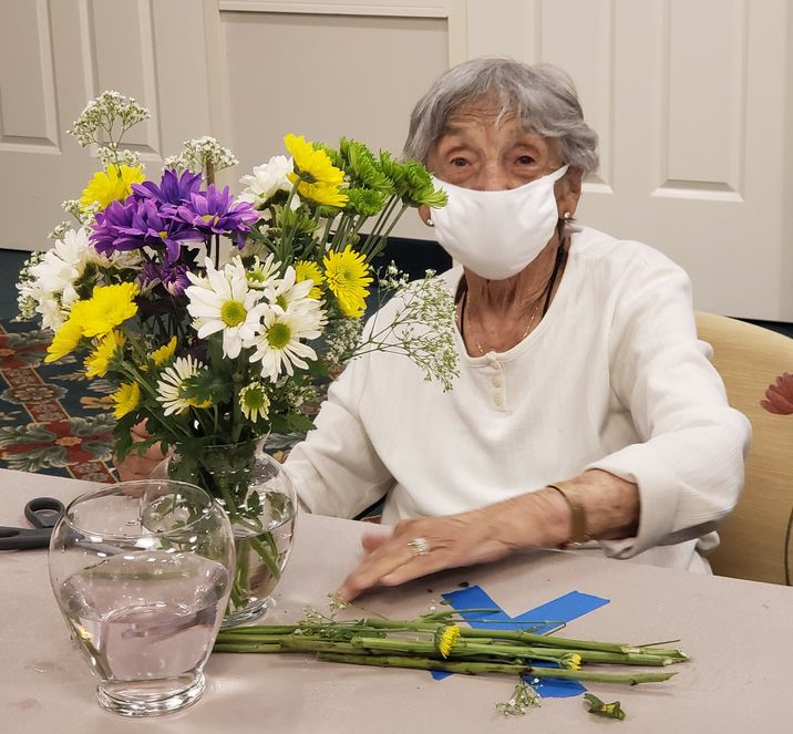 senior woman flower decoration